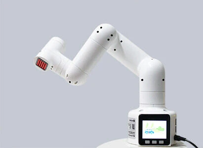 The myCobot 280: a small white six-axis desktop robot arm, reaching forward from its base, with a status screen on the base.